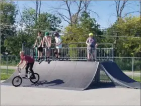  ?? JORDANA JOY - MORNING JOURNAL ?? Vermilion high schoolers shred off some steam on a blistering­ly hot day at Vermilion’s newly renovated Skate Spot.