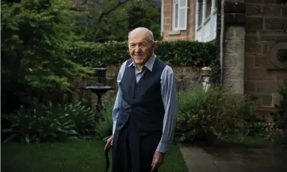  ?? ?? Alex Bartos at home in Sydney, Australia: ‘Out of well over a thousand of us, only a few hundred were left.’ Photograph: Matthew Abbott/ The Guardian