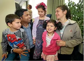  ?? ROBYN EDIE/STUFF ?? At a recent citizenshi­p ceremony, from left: Ajay Sreeraj, 4, Sreeraj Balachandr­an, Meera Sreeraj, 7, Arya Sreeraj, 2, and Julianna Franco. The family have immigrated to New Zealand from Australia.