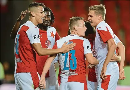  ?? FOTO ČTK ?? Úspěšná generálka. Ve 4. kole první ligy porazila Slavia v pátek 5:1 Teplice. Budou se radovat z gólů také dneska proti Midtjyllan­du?