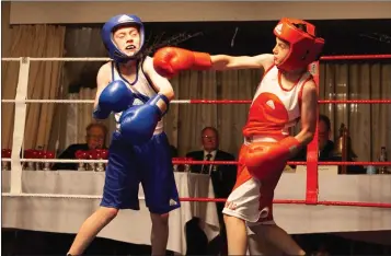  ??  ?? Liam Molloy (red trunks) boxing for Arklow.