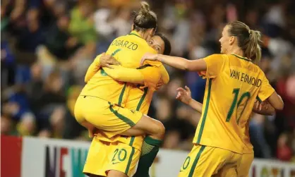  ??  ?? Matildas players celebrate one of Sam Kerr’s two goals during the win over Brazil at McDonald Jones Stadium. Photograph: Tony Feder/Getty Images