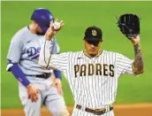  ?? RONALD MARTINEZ GETTY IMAGES ?? Padres third baseman Manny Machado says of the Dodgers: “It’s their reign. And it’s their division, honestly. But we’re coming. We’re definitely coming.”