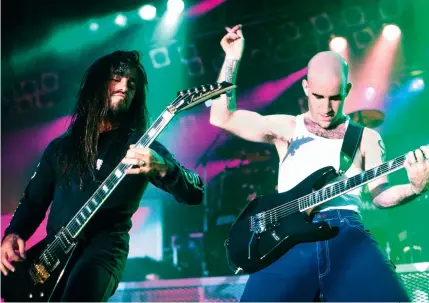  ??  ?? Above
Dan Spitz and Scott Ian of Anthrax on stage in the 90s
