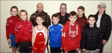  ??  ?? St. Michael’s New Ross pictured with their coaches, Michael Richardson and Bosco Greene.