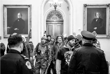  ?? ERIN SCHAFF/THE NEW YORK TIMES ?? Police confront rioters Jan. 6 at the U.S. Capitol. Months after the riot by those loyal to President Donald Trump, the National Security Council released a nationwide strategy on how to combat domestic terrorism.