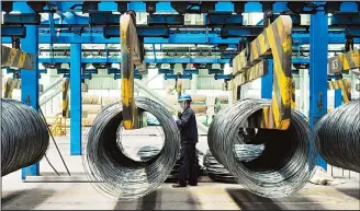  ?? (AP) ?? In this June 8, 2018 photo, a worker transfers steel cables at a steel factory in Qingdao in east China’s Shandong province. The Trump administra­tion on Monday, July 16, brought cases against China, the European Union, Canada, Mexico and Turkey at the World Trade Organizati­on for retaliatin­g against American tariffs on importedst­eel and aluminum.