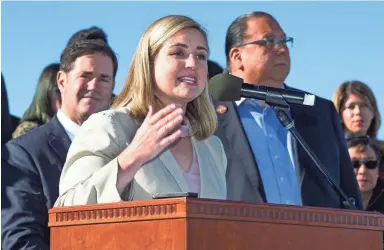  ?? PHOTOS BY TOM TINGLE/THE REPUBLIC ?? Phoenix Mayor Kate Gallego speaks at a ceremony marking the completion of the Loop 202 Ed Pastor Freeway around South Mountain. Wednesday’s ceremony took place near Southern Avenue.