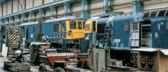  ?? STEVE TURNER. ?? Eastleigh Works was taken out of BREL and included in BR’s maintenanc­e group, helped by its location in southern England. On February 25 1978, 08950, 73111 and 33211 were receiving attention.