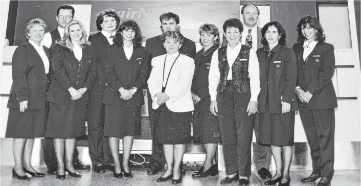  ?? NICOLE SULLIVAN ■ SALTWIRE ?? The customer service staff at the Air Nova kiosk at the Sydney airport in a photo believed to be around 1990. Pictured here in the front row last is Clare Macdougall and Leslie Macarthur.