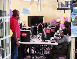  ?? ?? LEARNERS AT WORK: The computers received by Tlhale Primary School are already helping the school pupils.