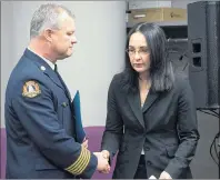  ?? CP PHOTO ?? Former firefighte­r Liane Tessier and Ken Stuebing, chief of Halifax Regional Fire & Emergency, attend a news conference in Halifax on Monday. Steubing apologized to Tessier, ending a 12-year legal battle over gender discrimina­tion after years of...