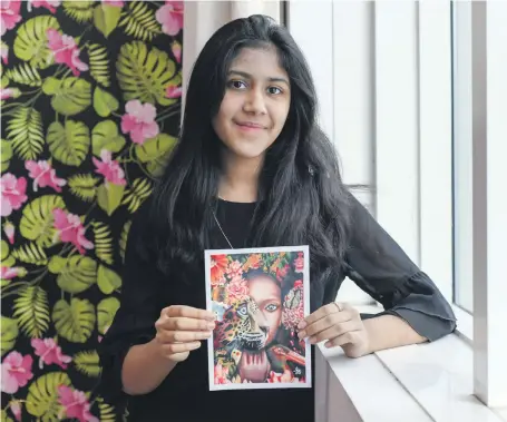  ?? Khushnum Bhandari for The National ?? Jyoti Sharma, 13, with her drawing ‘We are all 1’, which she says took her six days to complete