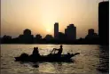  ?? AP PHOTO/HASSAN AMMAR, FILE ?? In this 2015 file photo, Egyptian fishermen row on the Nile River in Cairo, Egypt. Sherine Abdel-Wahab, a famous Arab singer widely known by her first name, has been banned from performing in her native Egypt after advising against drinking from the...