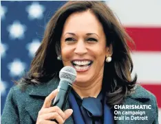  ??  ?? CHARISMATI­C On campaign trail in Detroit