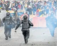 ?? AFP ?? En Colombia se discute sobre la necesidad de una reforma a la Policía Nacional. /