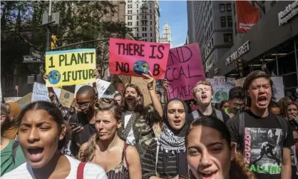  ?? Photograph: Bebeto Matthews/AP ?? A protest in New York last September. ‘The horse race that matters most is humanity’s collective race to defuse the climate emergency.’