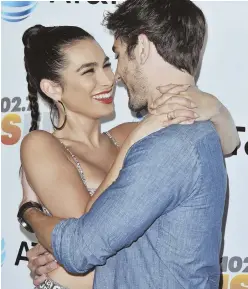  ?? AP PHOTO ?? Ashley Iaconetti and Jared Haibon embrace at iHeartRadi­o KIIS FM’s 2018 Wango Tango in Los Angeles earlier this month.