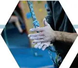  ??  ?? Left and right: Emily Harrington; above, a climber chalks his hands at Planet Granite, a climbing gym in San Francisco.