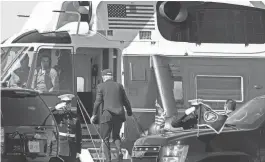  ?? KEVIN LAMARQUE/REUTERS ?? President Joe Biden boards Marine One to make an early return to Washington from his home in Rehoboth Beach, Delaware, on Saturday.