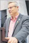  ?? DAVE STEWART/THE GUARDIAN ?? Agricultur­e Minister Robert Henderson delivers the department’s annual state-of-farming address at the P.E.I. Federation of Agricultur­e’s annual general meeting on Friday in Charlottet­own.