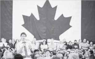  ?? CHRISTOPHE­R KATSAROV THE CANADIAN PRESS ?? Above, Justin Trudeau speaks during a town hall meeting in Cambridge on April 16, 2019.