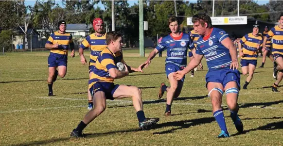  ?? Photo: Sam Flanagan ?? COLLISION COURSE: Dalby's Matt Donovan looks to beat the defence of Andre van Staden for USQ in their round-15 Risdon Cup match at John Ritter Oval.