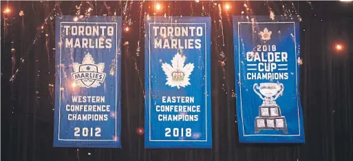  ?? RENE JOHNSTON TORONTO STAR ?? The first AHL championsh­ip banner in Toronto Marlies history was raised to the rafters at Coca-Cola Coliseum before a crowd of 6,400 on Monday.