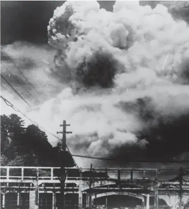  ??  ?? Fearsome: A mountain of smoke and dust erupts into the skies over Hiroshima — reports suggest that the air has yet to clear