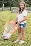  ?? John Powers/Contribute­d photo ?? Mackenzie Powers with a Garbo Grabber litter cleanup kit during “Mackenzie’s Beach Clean Up” event at Walnut Beach in 2022.