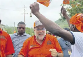  ?? ?? People’s National Party President Mark Golding on the campaign trail earlier this month