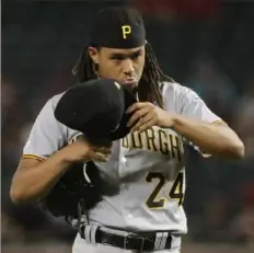  ?? Associated Press ?? Chris Archer walks off the mound after giving up three runs in the first inning to the Diamondbac­ks in an 11-1 loss Wednesday, his first start since coming off the injured list.