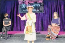  ?? ROSIE MULLALEY • THE TELEGRAM ?? Allison Kelly performs a segment from the play “What is She Wearing” Tuesday during an event held at Canadian AV facility in St. John’s and hosted by the Persistenc­e Theatre Company to commemorat­e the 100th anniversar­y of propertyow­ning women obtaining the right to vote in municipal elections.