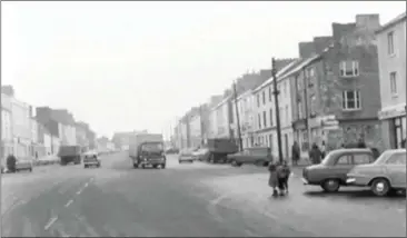  ??  ?? A still of Lower Main Street, Castleisla­nd from the RTÉ visit which was screened on February 12, 1968.