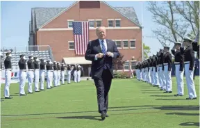  ?? SAUL LOEB, AFP/GETTY IMAGES ?? President Trump spoke Wednesday to U.S. Coast Guard Academy graduates.