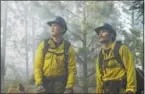  ?? PHOTO BY RICHARD FOREMAN — COURTESY OF SONY PICTURES ?? Brendan McDonough (Miles Teller), Chris MacKenzie (Taylor Kitsch), plan to do the backburn at the Chiricahua Mtn. fireline in “Only The Brave, The True Story Of The Granite Mountain Hotshots.”