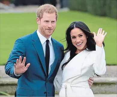  ?? EDDIE MULHOLLAND THE ASSOCIATED PRESS ?? Britain's Prince Harry, left, and Meghan Markle will wed Saturday, May 19.