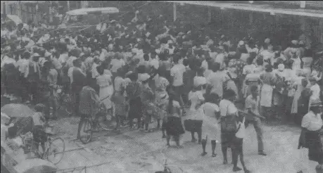  ??  ?? BREAD, like gold is where you find it, and this unruly crowd has found it at a bakery in Albouystow­n. With a bag of flour being sold on the blackmarke­t at $3,000 , bread prices have gone through the ceiling.