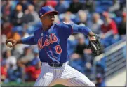  ?? THE ASSOCIATED PRESS ?? In this Feb. 28, 2020, file photo, New York Mets pitcher Marcus Stroman throws during the first inning of a spring training baseball game against the St. Louis Cardinals in Port St. Lucie, Fla. Stroman and San Francisco starter Kevin Gausman accepted qualifying offers Wednesday, Nov. 11, receiving one- year deals to stay with their teams rather than test what they could get in free agency.