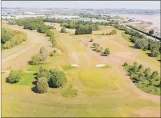  ?? Picture: Nigel Willis/Voladrone ?? BACK ON COURSE Portsmouth Golf Centre on May 13 - the day courses were permitted to reopen - after being closed for several weeks.