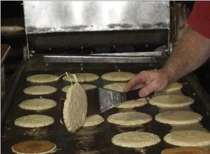  ?? PHOTOS COURTESY OF CHRIS CAKES OF MICHIGAN VIA FACEBOOK ?? Chris Cakes of Michigan will be flipping flying flapjacks Saturday as part of the Shepherd Maple Syrup Festival.