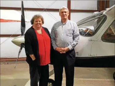  ?? TRACEY READ — THE NEWS-HERALD ?? The Geauga County Airport in Middlefiel­d Village and Township will celebrate 50 years on Sept. 29. Pictured are Patty Fulop, the board’s secretary/treasurer/manager, and Board President William Meyer.