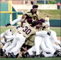  ?? Photo courtesy of Sun Belt Conference ?? Louisiana-monroe players celebrate in the infield after defeating Arkansas State 4-2 in the Sun Belt Conference Tournament championsh­ip game on Sunday in Bowling Green, Ky. The Warhawks scored three runs in the eighth to take the lead.