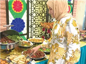  ?? Photo: Lise Poulsen Floris ?? Sajida Omar at an Iftar buffet in Kuala Lumpur.