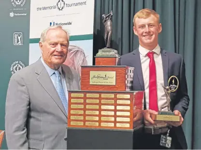  ??  ?? Callum Bruce of Duff House Royal, right, with golfing legend Jack Nicklaus, having won the award named after the famous player for being top junior college player.