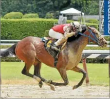  ?? STAN HUDY - SHUDY@DIGITALFIR­STMEDIA.COM ?? The Saratoga Race Course track was listed as sloppy allday, as Saratoga native Dylan Davis rides Formal Event to a third-place finish in his second race Monday afternoon.