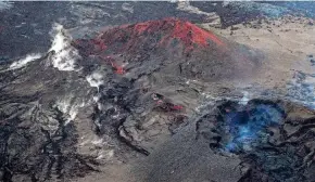  ?? ROBYN BECK/AFP VIA GETTY IMAGES ?? The U.S. Geological Survey announced that Mauna Loa, the world’s largest active volcano, has stopped erupting. A separate statement said Kilauea, also located in Hawaii, has stopped erupting.
