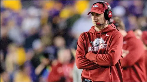  ?? AP File Photo/MATTHEW HINTON ?? Arkansas coach Barry Lunney Jr., walks the sidelines against LSU in an NCAA game Saturday in Baton Rouge, La. Lunney made a pitch to Razorback fans Monday to show support for the struggling team for today’s season finale at War Memorial Stadium in Little Rock.