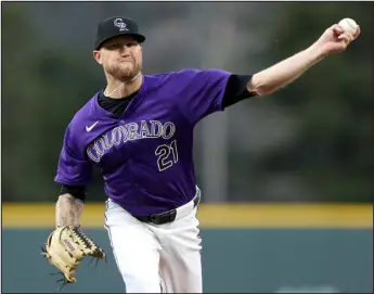  ?? MATTHEW STOCKMAN — GETTY IMAGES ?? Rockies pitcher Kyle Freeland works against the Arizona Diamondbac­ks in the first inning on Monday at Coors Field.