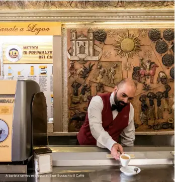  ?? ?? A barista serves espresso at Sant’Eustachio il Caffè